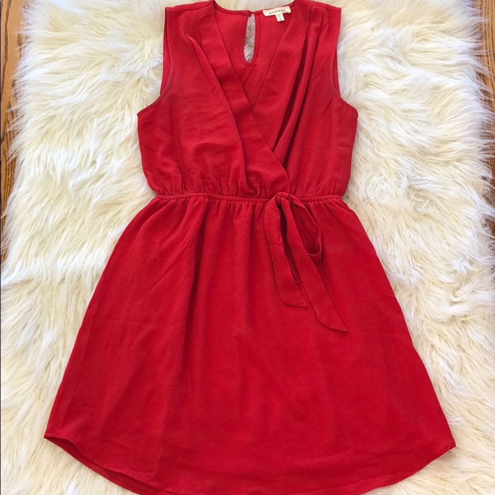 Red Sleeveless Dress with Cinched Waist and Bow